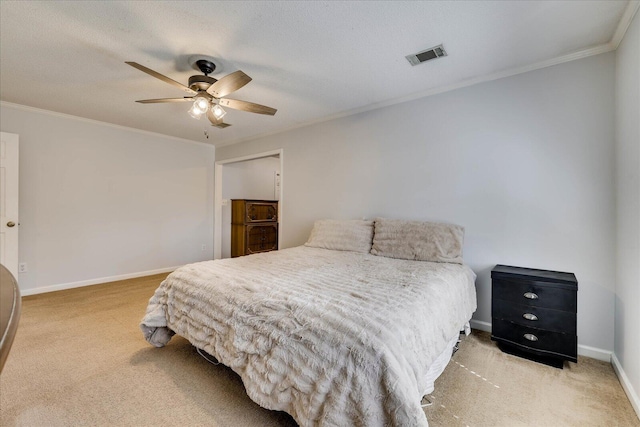 bedroom featuring visible vents, light colored carpet, baseboards, and ornamental molding