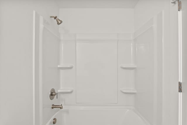 bathroom with shower / bathing tub combination