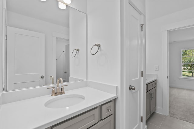 bathroom featuring tile patterned floors and vanity