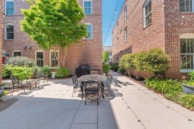 450 Railroad Ave Unit 4B, North Augusta, SC 29841 - view of patio / terrace featuring outdoor dining space and area for grilling