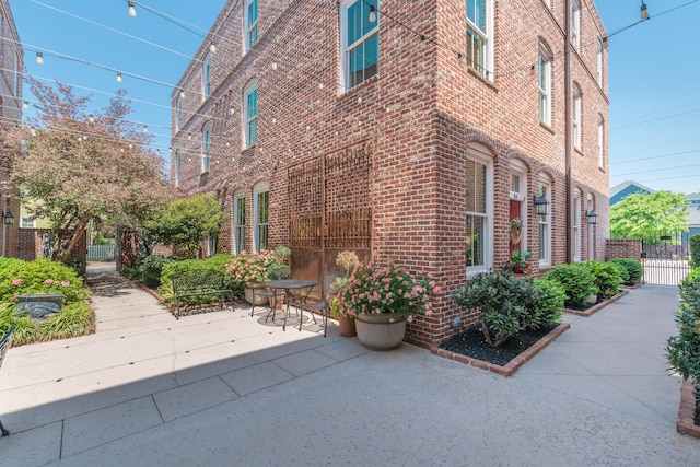 450 Railroad Ave Unit 4B, North Augusta, SC 29841 - exterior space featuring fence, brick siding, and a patio