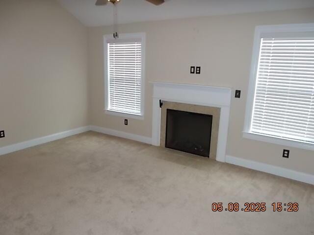 321 Firelight Dr, Grovetown, GA 30813 - unfurnished living room featuring ceiling fan, a fireplace with flush hearth, carpet floors, and baseboards