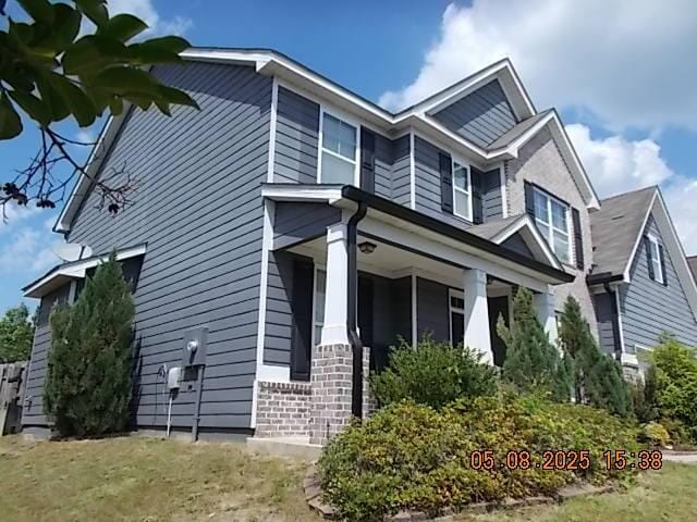 321 Firelight Dr, Grovetown, GA 30813 - view of side of property with a porch and brick siding