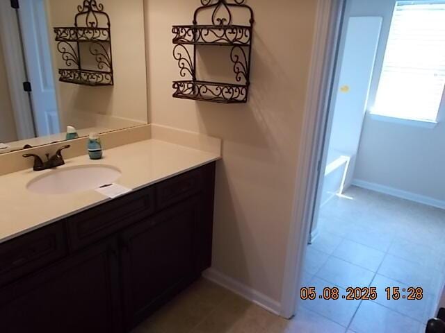 321 Firelight Dr, Grovetown, GA 30813 - bathroom featuring baseboards, vanity, and tile patterned floors
