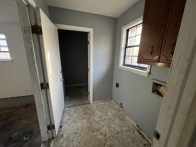 laundry area featuring hookup for a washing machine, cabinets, and electric dryer hookup