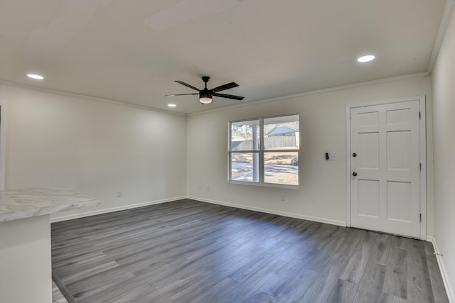 unfurnished living room with ceiling fan, crown molding, and hardwood / wood-style floors