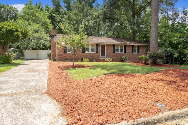 ranch-style house with a front yard