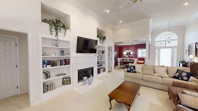 3018 Hillcreek Dr, Augusta, GA 30909 - living area with crown molding, carpet, a chandelier, built in shelves, and ceiling fan