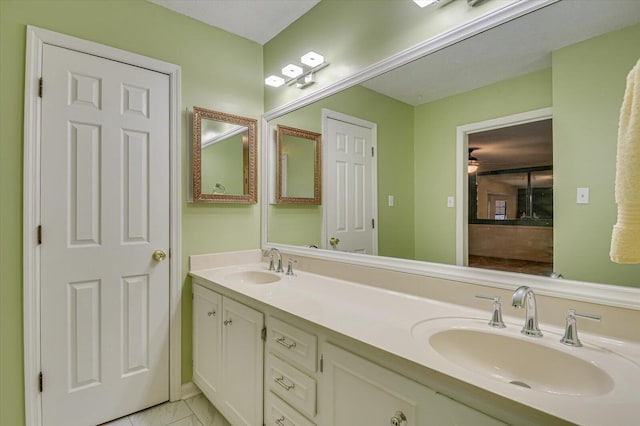 bathroom featuring double vanity and a sink