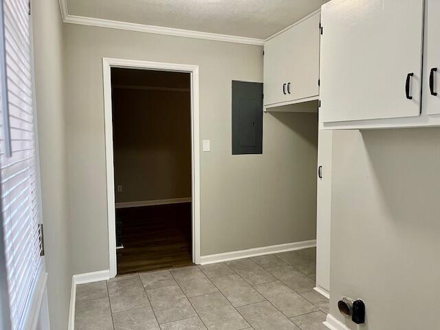141 Glenora Dr, Martinez, GA 30907 - interior space featuring electric panel, light tile patterned floors, baseboards, and ornamental molding