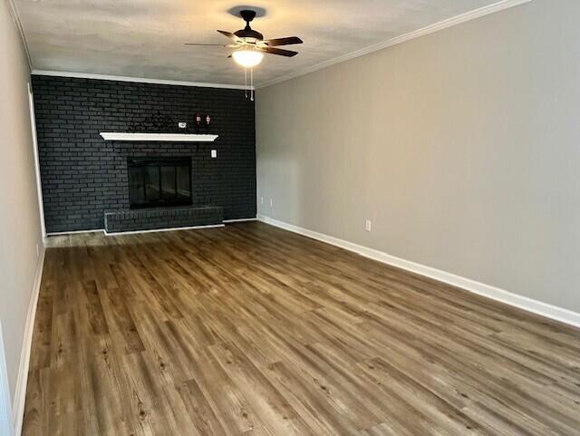 141 Glenora Dr, Martinez, GA 30907 - unfurnished living room featuring wood finished floors, baseboards, ornamental molding, and ceiling fan