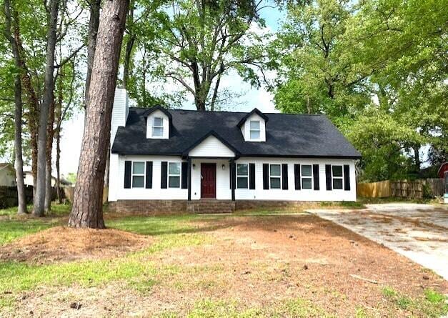 141 Glenora Dr, Martinez, GA 30907 - cape cod-style house featuring fence and driveway