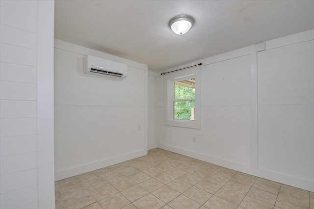 spare room with a wall unit AC