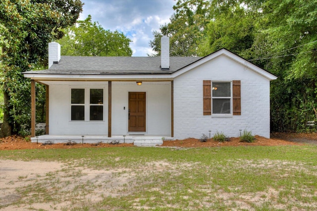 view of front of home featuring covered porch