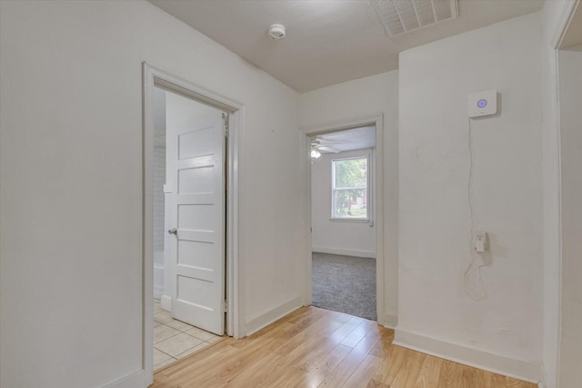 hall featuring light wood-type flooring