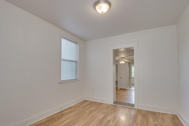 unfurnished room with light hardwood / wood-style flooring