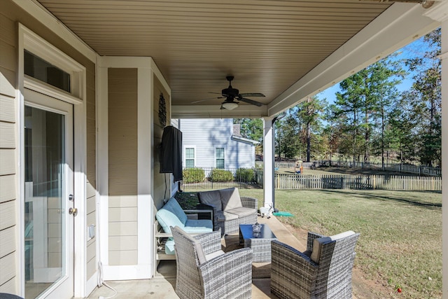 view of patio / terrace featuring french doors, ceiling fan, and an outdoor living space