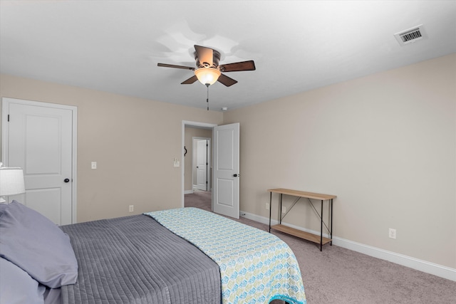 carpeted bedroom featuring ceiling fan