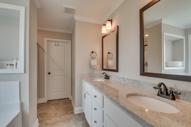 full bathroom with double vanity, a sink, and ornamental molding