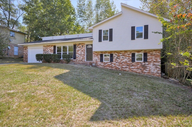 split level home featuring a garage and a front lawn