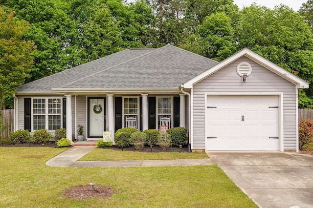 361 Redbud Dr, North Augusta, SC 29860 - ranch-style house featuring an attached garage, roof with shingles, concrete driveway, and a front lawn