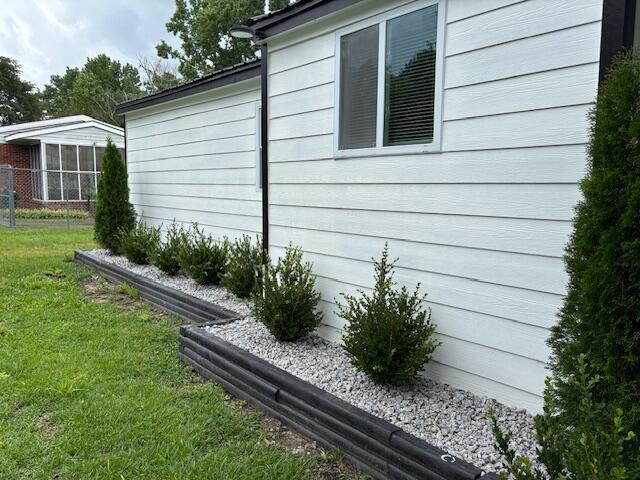 875 Earle St, Thomson, GA 30824 - view of side of property featuring a lawn