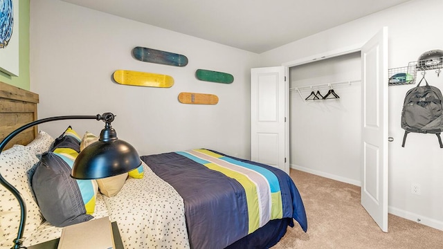 bedroom featuring a closet, carpet flooring, and baseboards