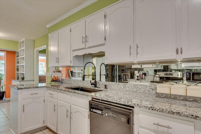 101 Hartwell Dr, Aiken, SC 29803 - kitchen with stainless steel appliances, a sink, white cabinetry, light stone counters, and light tile patterned flooring