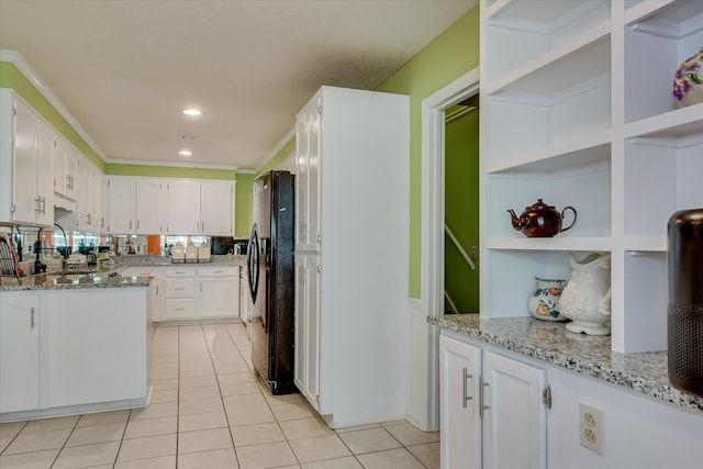 101 Hartwell Dr, Aiken, SC 29803 - kitchen with open shelves, freestanding refrigerator, light tile patterned flooring, white cabinets, and recessed lighting