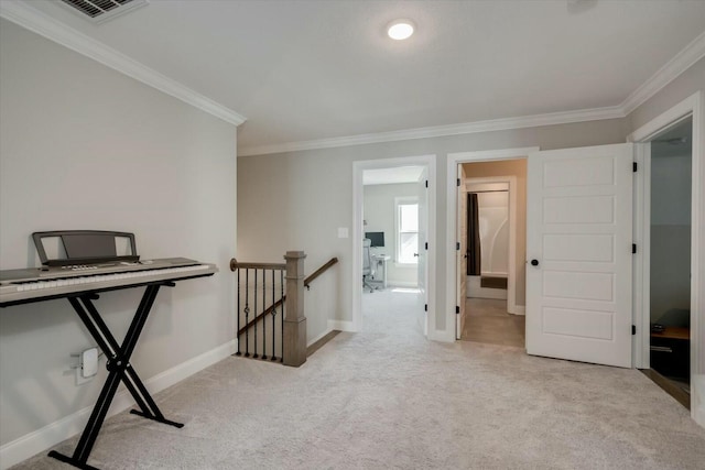 corridor with light carpet, ornamental molding, visible vents, and an upstairs landing