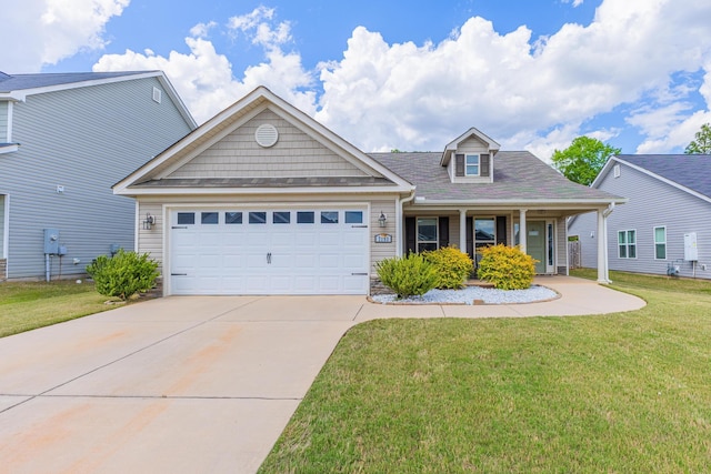 7193 Hanford Dr, Aiken, SC 29803 - view of front of home with a front yard, an attached garage, driveway, a porch, and stone siding