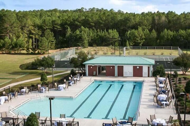 view of swimming pool featuring a patio