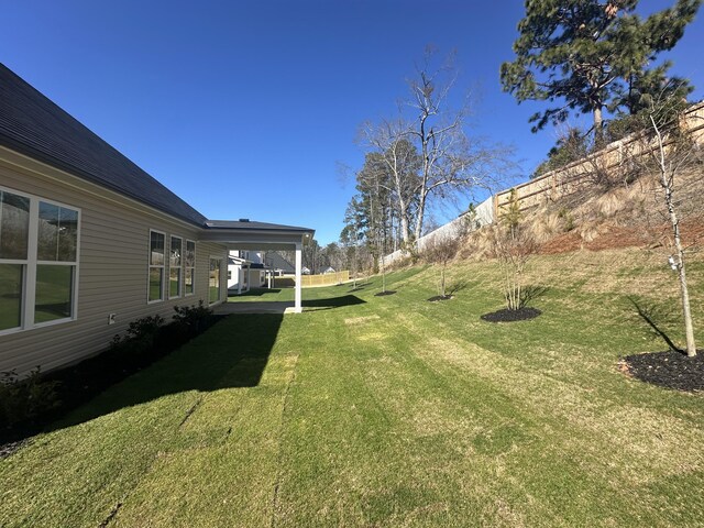 view of yard with fence