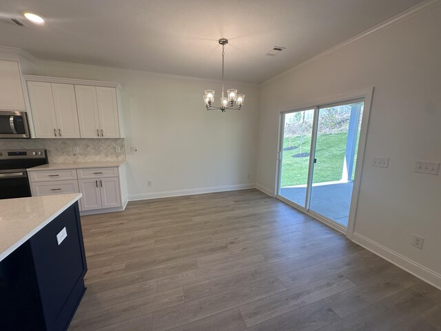 full bathroom featuring marble finish floor, a sink, a shower stall, and a spacious closet