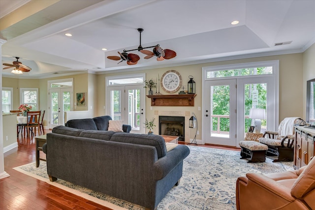 136 Lake Ridge Dr, Mccormick, SC 29835 - living area with a ceiling fan, ornamental molding, french doors, wood-type flooring, and a tray ceiling
