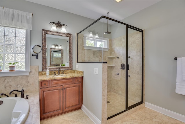 136 Lake Ridge Dr, Mccormick, SC 29835 - full bath featuring a garden tub, a stall shower, vanity, and baseboards