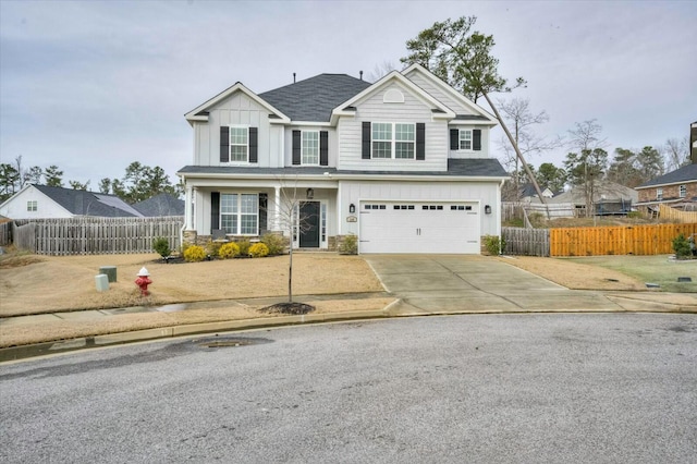 view of front of property with a garage