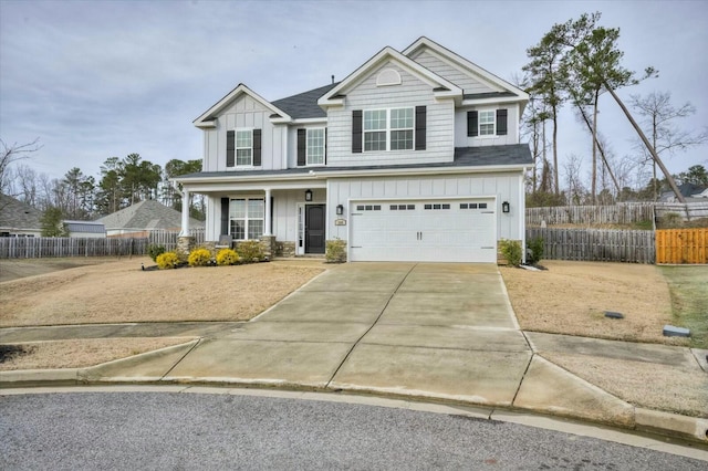 view of front of house featuring a garage and covered porch