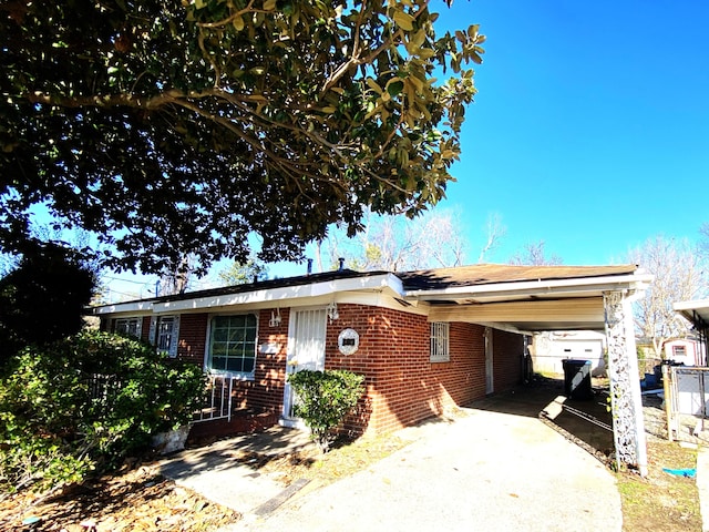 view of front of house featuring a carport