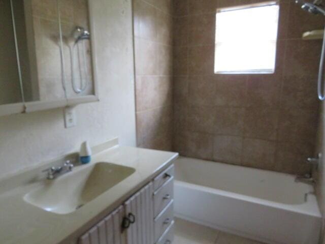 1466 Dewitt St, Augusta, GA 30901 - bathroom with vanity, bathtub / shower combination, and tile patterned flooring