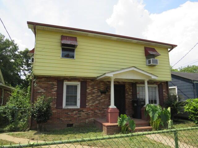 1466 Dewitt St, Augusta, GA 30901 - view of front facade with crawl space, brick siding, and cooling unit