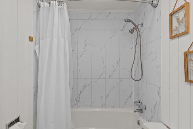 bathroom featuring shower / tub combo with curtain and ornamental molding