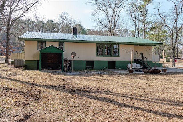 view of front of home featuring cooling unit