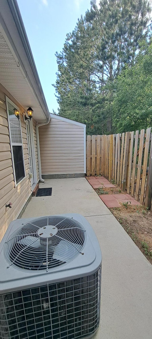 231 Lynbrook Way, Grovetown, GA 30813 - view of patio featuring central AC and fence