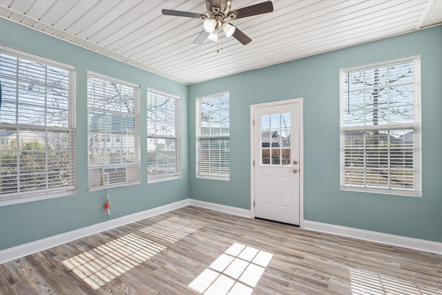 interior space with ceiling fan and light hardwood / wood-style floors