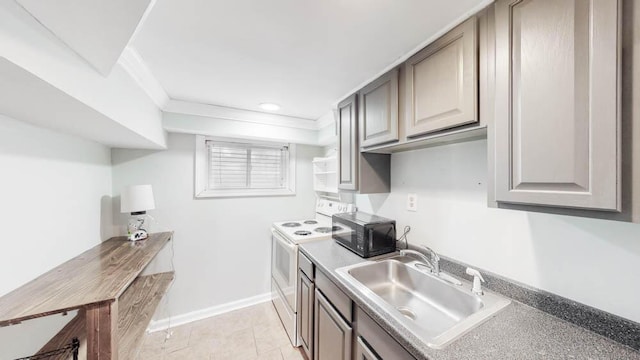 kitchen featuring crown molding, sink, light tile patterned floors, and white range with electric stovetop