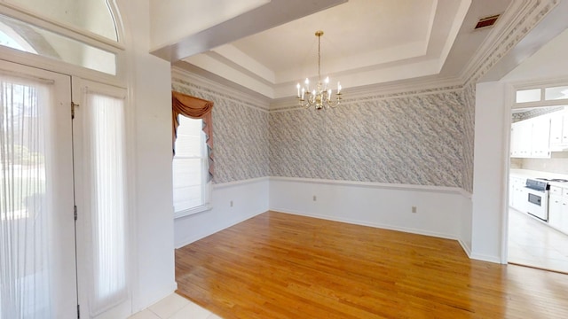 4154 Bent Tree Ln, Martinez, GA 30907 - unfurnished dining area featuring a chandelier, light wood-type flooring, and plenty of natural light