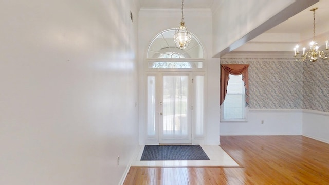 4154 Bent Tree Ln, Martinez, GA 30907 - entrance foyer featuring a chandelier, wood finished floors, crown molding, and baseboards
