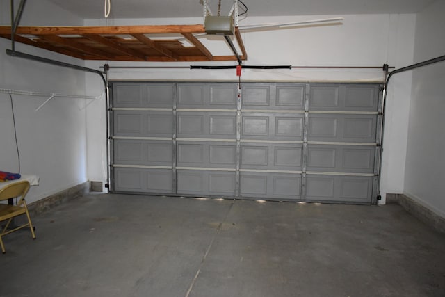 4154 Bent Tree Ln, Martinez, GA 30907 - garage featuring a garage door opener and baseboards