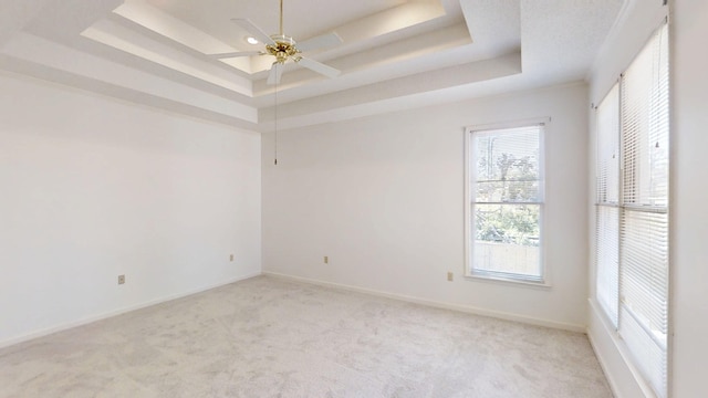 4154 Bent Tree Ln, Martinez, GA 30907 - empty room with a tray ceiling, light carpet, baseboards, and ceiling fan